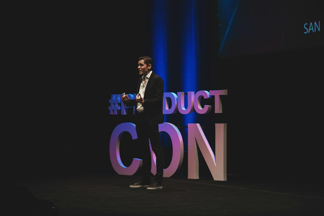 confident speaker on stage